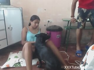 Filthy bitch seduces black dog for a hot zoo sex