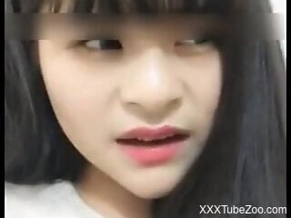Slender Asian chick doesn't mind having zoo sex